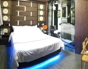 Letto o letti in una camera di Star City Hotel