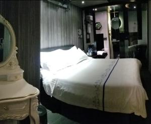 Letto o letti in una camera di Star City Hotel