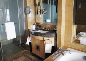 a bathroom with a sink and a shower at Wanda Vista Beijing in Beijing +83 photos