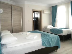 Postel nebo postele na pokoji v ubytování Sava Hotel + 21 fotografií