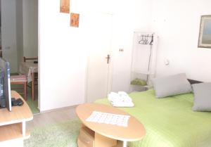 Postel nebo postele na pokoji v ubytování Apartments Delic