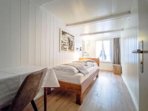 Voodi või voodid majutusasutuse Hotel Bären Guttannen toas