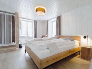 Voodi või voodid majutusasutuse Hotel Bären Guttannen toas