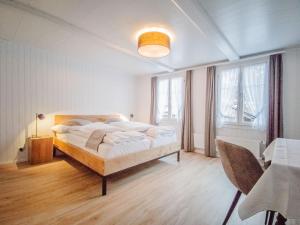 Voodi või voodid majutusasutuse Hotel Bären Guttannen toas