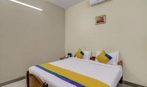 Postel nebo postele na pokoji v ubytování Itsy Hotels Shree Comforts