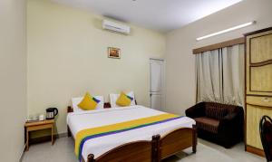 Postel nebo postele na pokoji v ubytování Itsy Hotels Shree Comforts