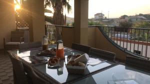 A balcony or terrace at B&B Villa Marinetti