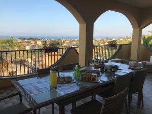 A balcony or terrace at B&B Villa Marinetti
