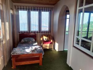 Postel nebo postele na pokoji v ubytování Bethany Homestay