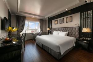 Ένα ή περισσότερα κρεβάτια σε δωμάτιο στο Imperial Hotel & Spa