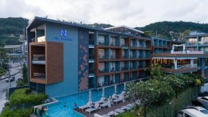 Bazén v ubytování The Nature Phuket - SHA Extra Plus nebo v jeho okolí