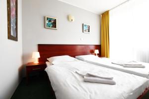 מיטה או מיטות בחדר ב-ALKA Sun Resort