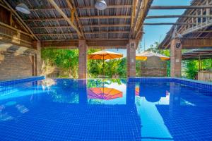 Piscina a Calm House Hotel Hoi An 1 o a prop