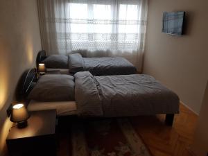 Un pat sau paturi într-o cameră la Apartment Strava