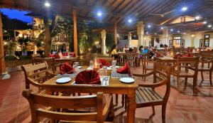 Reštaurácia alebo iné gastronomické zariadenie v ubytovaní Sandali Walauwa