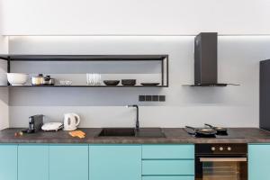 A kitchen or kitchenette at Luxury Penthouse on Akadimias with 2 Bed & 2 Bath