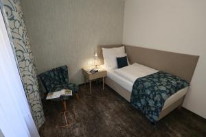 Posteľ alebo postele v izbe v ubytovaní ASTORIA Hotel & Medical Spa