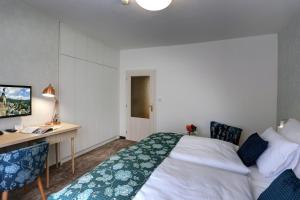 Posteľ alebo postele v izbe v ubytovaní ASTORIA Hotel & Medical Spa