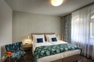 Posteľ alebo postele v izbe v ubytovaní ASTORIA Hotel & Medical Spa