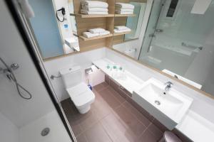 Koupelna v ubytování Hotel Cesar Augustus