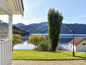 a view of a lake from a house at 6 person holiday home in Volda in Ålesund