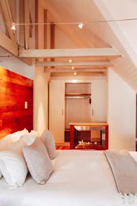 מיטה או מיטות בחדר ב-De Haas Living @ Die Laan 40