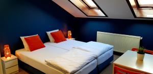 Posteľ alebo postele v izbe v ubytovaní Hello Hostel & Apartments