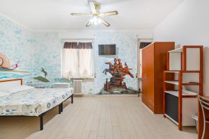 Łóżko lub łóżka w pokoju w obiekcie Lia Rooms 4
