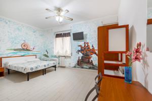 Łóżko lub łóżka w pokoju w obiekcie Lia Rooms 4