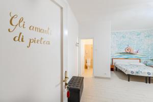 Łóżko lub łóżka w pokoju w obiekcie Lia Rooms 4