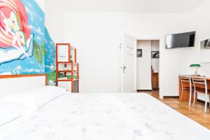 Łóżko lub łóżka w pokoju w obiekcie Lia Rooms 4