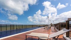 Balcó o terrassa a Apartamento NOVO - Beira mar de Intermares