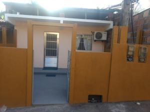an open door of a building with a door at Sampeba in Ilha de Boipeba