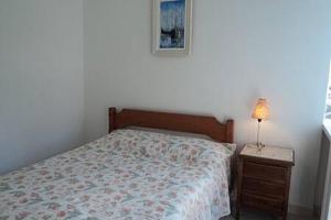Un pat sau paturi într-o cameră la Angra - Apto Pé na Areia - Bracuhy