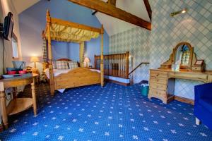 Krevet ili kreveti u jedinici u okviru objekta The Ennerdale Country House Hotel ‘A Bespoke Hotel’