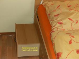 Ein Bett oder Betten in einem Zimmer der Unterkunft Järgen Ferienappartements