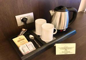 Принадлежности для чая и кофе в Hotel Como