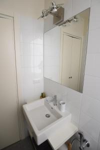 Ванная комната в Lake Como Holiday Apartments