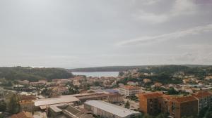 an aerial view of a city with a body of water at Apartment Patricia in Rab