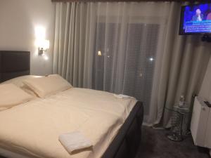 Postel nebo postele na pokoji v ubytování Hotel Kurhaus Uhlenberg