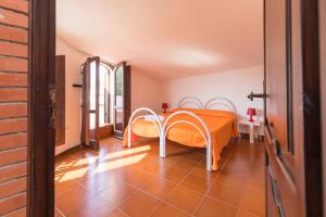 Katil atau katil-katil dalam bilik di Villa Melisa