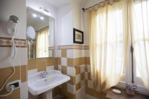 Koupelna v ubytování Les Suite Royales