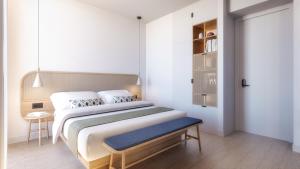 Postel nebo postele na pokoji v ubytování Hotel Serawa Alicante
