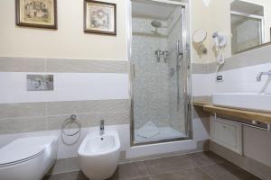 Koupelna v ubytování Les Suite Royales