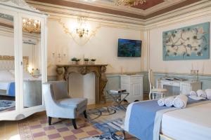 Posezení v ubytování Les Suite Royales