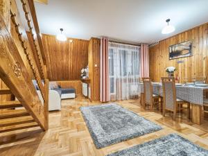 Posedenie v ubytovaní Apartament Dwupoziomowy Pardałówka