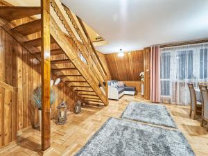 Posteľ alebo postele v izbe v ubytovaní Apartament Dwupoziomowy Pardałówka