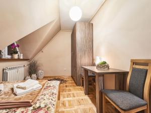 Posedenie v ubytovaní Apartament Dwupoziomowy Pardałówka
