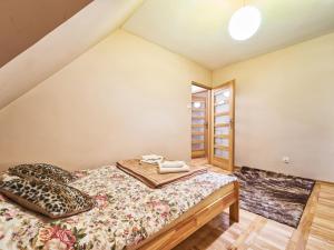 Posteľ alebo postele v izbe v ubytovaní Apartament Dwupoziomowy Pardałówka