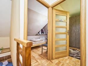 Posteľ alebo postele v izbe v ubytovaní Apartament Dwupoziomowy Pardałówka
